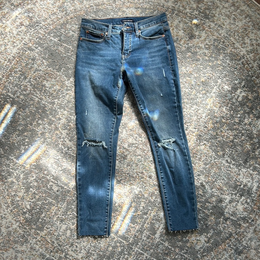 Distressed Mid-Rise Skinny Jeans
